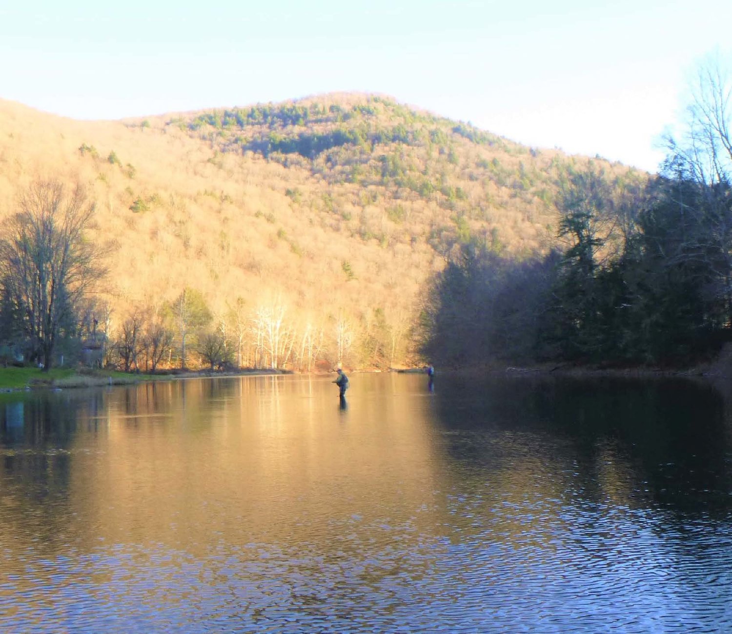 Anglers on the river during a beautiful, late fall day